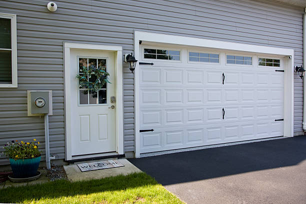 24/7 Emergency Garage Door Panel Replacement experts in Midfield, AL